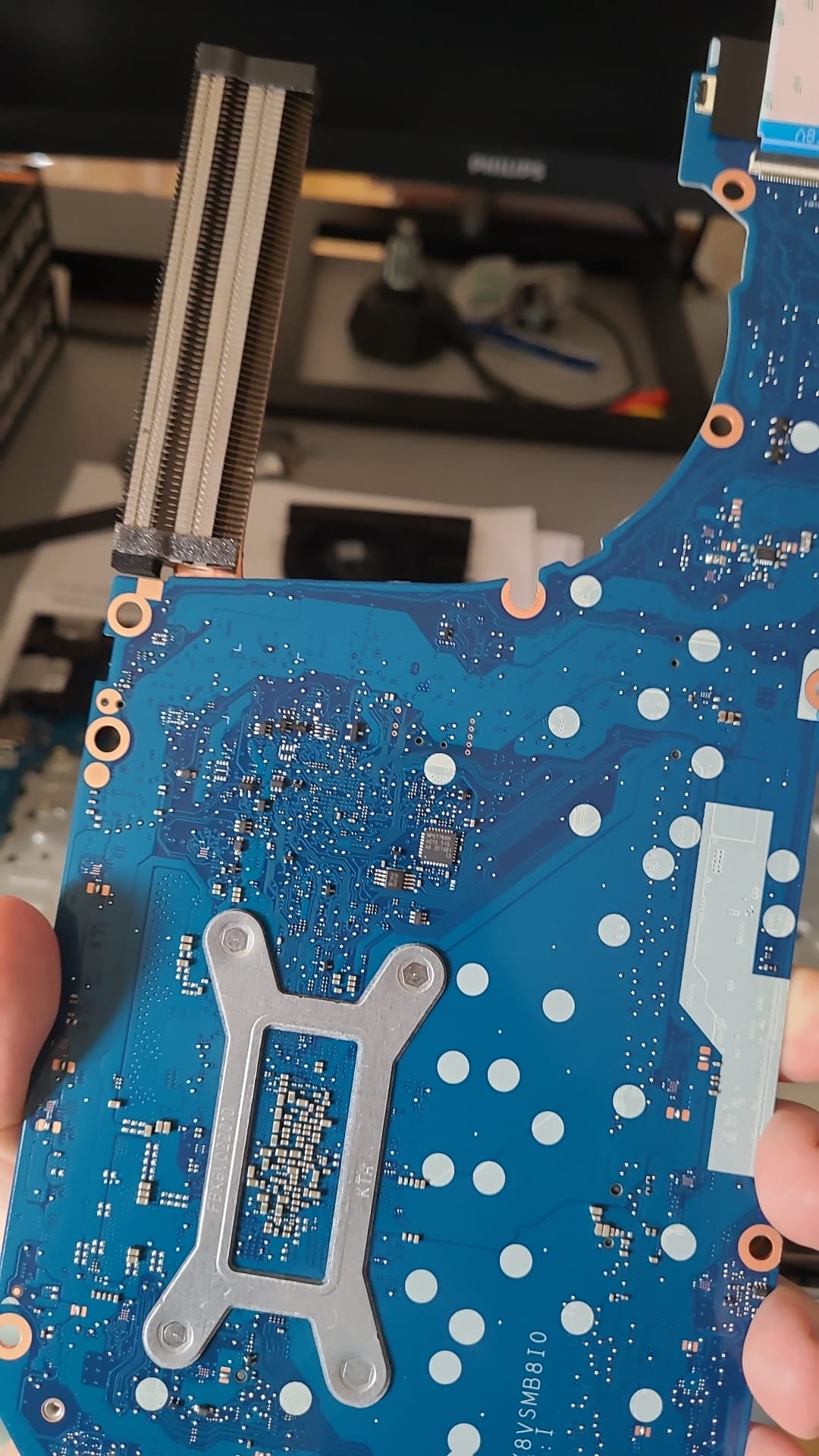 Nuvoton NPCT7 TPM on motherboard's backside of HP ProBook 4